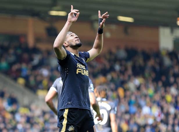 Joelinton of Newcastle United celebrates after scoring their side's first goal during the Premier League match between Norwich City and Newcastle United at Carrow Road on April 23, 2022 in Norwich, England. (Photo by Stephen Pond/Getty Images)