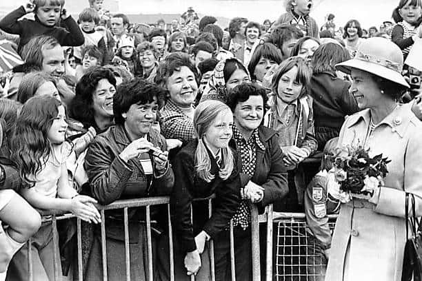 Delighted crowds get a close-up view of the Queen. Can you spot someone you know? Photo: Freddie Mudditt (Fietscher Fotos)