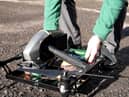 Loading up the Holland's pies on the drone for delivery (photo: Ben Frith)