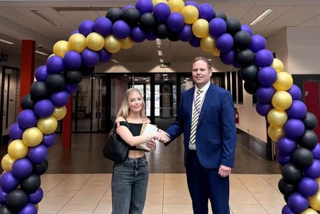 Student receiving GCSE results at Cardinal Hume