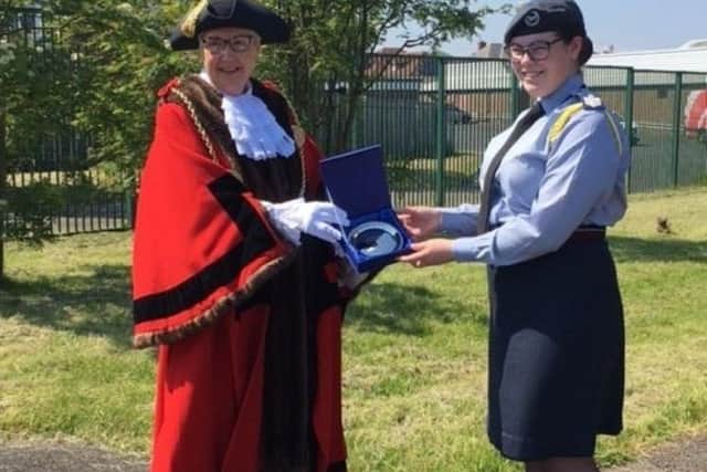 The Mayor also presents a plaque to Flight Sergeant Laura Tearle