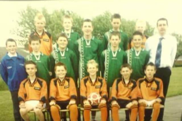 Dan Burn (front row, centre with ball) at Wensleydale Middle School, in Blyth.