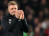 Newcastle United head coach Eddie Howe applauds the fans at the final whistle.