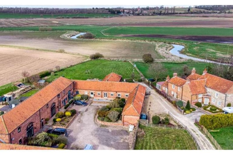 Aerial view of Abbey Hamlet, a small group of barn conversions and the original farmhouse in close proximity to the ancient monument known as Mattersey Priory.