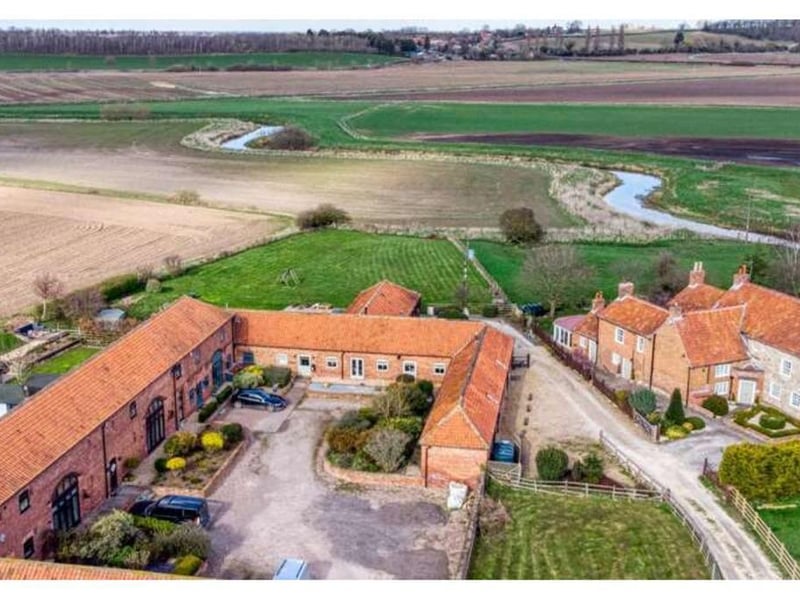 Aerial view of Abbey Hamlet, a small group of barn conversions and the original farmhouse in close proximity to the ancient monument known as Mattersey Priory.