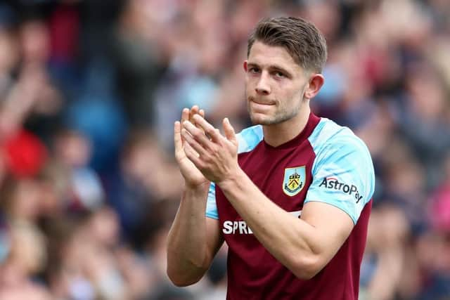 James Tarkowski of Burnley applauds the fans following defeat and relegation to the Sky Bet Championship following the Premier League match between Burnley and Newcastle United at Turf Moor on May 22, 2022 in Burnley, England. (Photo by Jan Kruger/Getty Images)