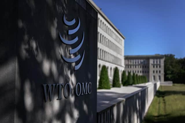 A photo taken on May 28, 2020 in Geneva shows the World Trade Organization (WTO) headquarters at sunrise. - Candidates to succeed Roberto Azevedo as head of the WTO will have one month from June 8 to submit their nominations, the global trade body said following the Brazilian's surprise resignation. (Photo by Fabrice COFFRINI / AFP) (Photo by FABRICE COFFRINI/AFP via Getty Images)