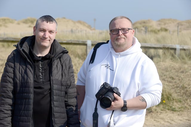Out and about at Sandhaven Beach. From left, Mark Hunter and Stanis.
