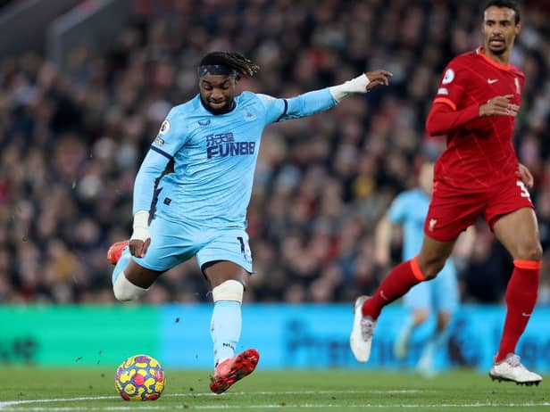 Allan Saint-Maximin of Newcastle United shoots during the Premier League match between Liverpool and Newcastle United at Anfield on December 16, 2021 in Liverpool, England. (Photo by Clive Brunskill/Getty Images)