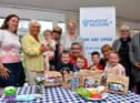 Mayor Cllr Pat Hay, seated left and mayoress Mrs Jean Copp, seated right, at Saint Peter's Church Centre pack lunch family initiative.