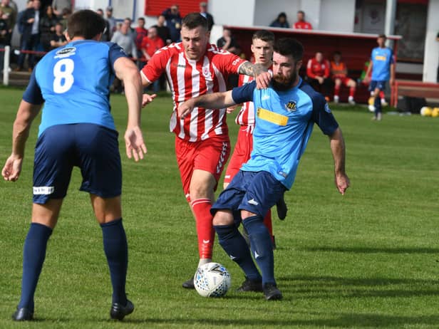 Seaham Red Star (red/white) v Hebburn Town  (blue) at Seaham Town Park.