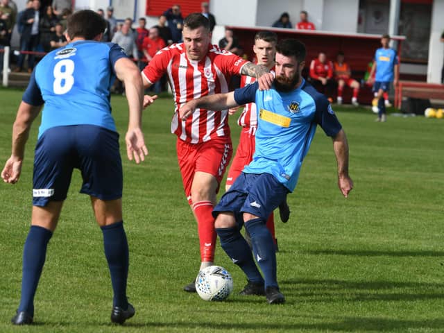 Seaham Red Star (red/white) v Hebburn Town  (blue) at Seaham Town Park.