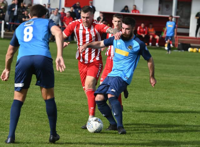 Seaham Red Star (red/white) v Hebburn Town  (blue) at Seaham Town Park.