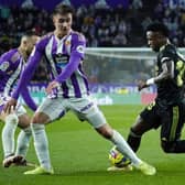 Real Valladolid's Spanish defender Ivan Fresneda (C) vies with Real Madrid's Brazilian forward Vinicius Junior during the Spanish League football match between Real Valladolid FC and Real Madrid CF at the Jose Zorilla stadium in Valladolid on December 30, 2022. (Photo by CESAR MANSO / AFP) (Photo by CESAR MANSO/AFP via Getty Images)