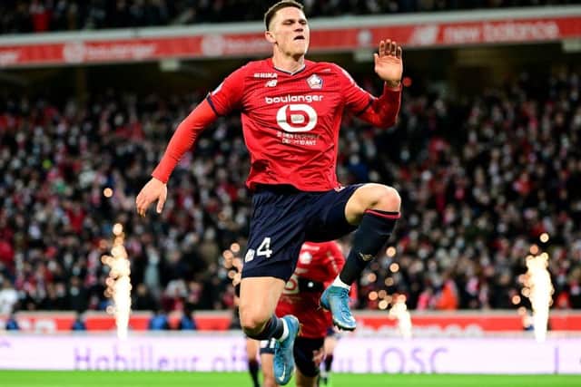 Lille's Dutch defender Sven Botman celebrates after scoring a goal during the French L1 football match between Lille and Paris Saint-Germain at the Pierre-Mauroy stadium in Villeneuve-d'Ascq, near Lille, on February 6, 2022. (Photo by DENIS CHARLET / AFP) (Photo by DENIS CHARLET/AFP via Getty Images)