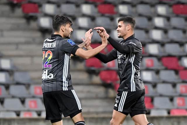 Bruno Guimaraes and Lucas Paqueta struck up a great partnership whilst at Lyon together (Photo by NICOLAS TUCAT/AFP via Getty Images)