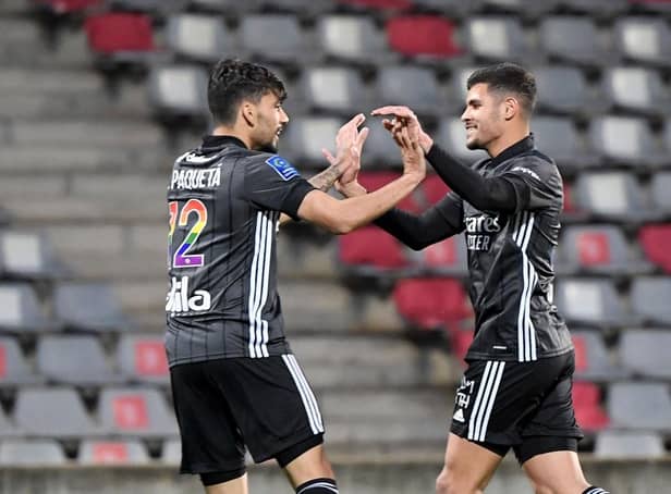 Bruno Guimaraes and Lucas Paqueta struck up a great partnership whilst at Lyon together (Photo by NICOLAS TUCAT/AFP via Getty Images)