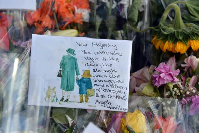 Floral tributes were left to Her Majesty.