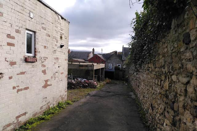 Looking towards the former Crystal Creations unit.