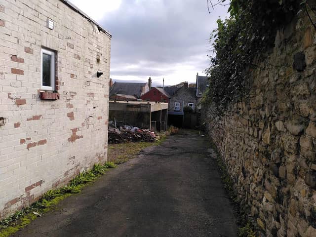 Looking towards the former Crystal Creations unit.