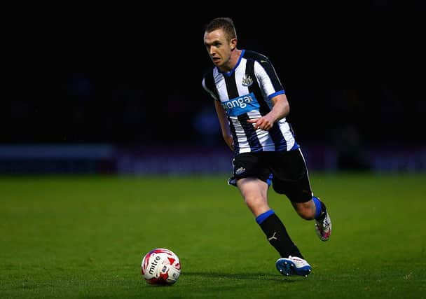 Shane Ferguson during his time with Newcastle United (Photo by Clive Mason/Getty Images)