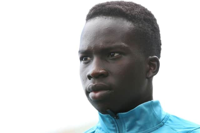 Garang Kuol speaks with media during a Socceroos squad announcement at King St Wharf on September 14, 2022 in Sydney, Australia. (Photo by Lisa Maree Williams/Getty Images)