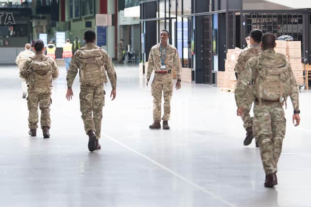 Soldiers and private contractors have already been brought in to help to prepare the ExCel centre in London, which has been turned into the temporary NHS Nightingale hospital. (Photo by Stefan Rousseau - WPA Pool/Getty Images)