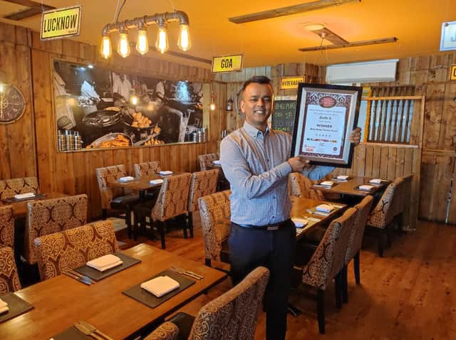 Lalon with his award.