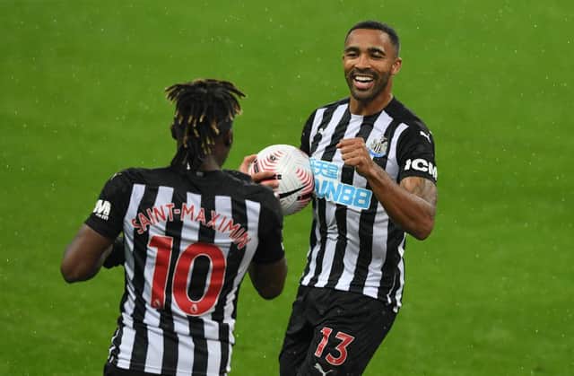 Newcastle striker Callum Wilson (r) celebrates with Allan Saint-Maximin after scoring his first and Newcastle's second goal during the Premier League match between Newcastle United and Burnley at St. James Park on October 03, 2020 in Newcastle upon Tyne, England.