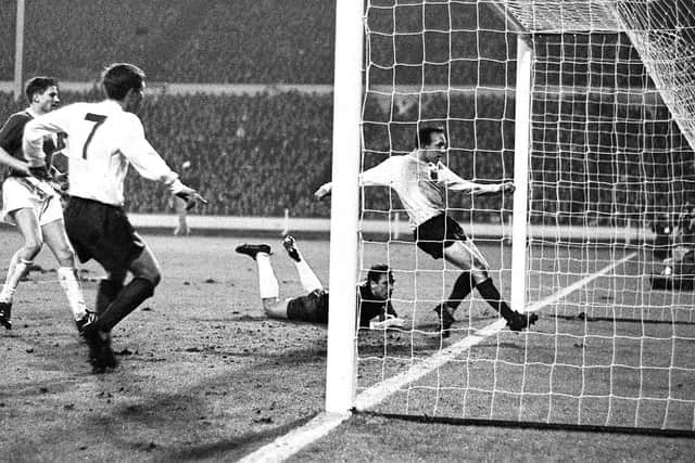 England's first goal scored by Nobby Stiles, a surprise choice centre-forward, in the international match against West Germany at Wembley.