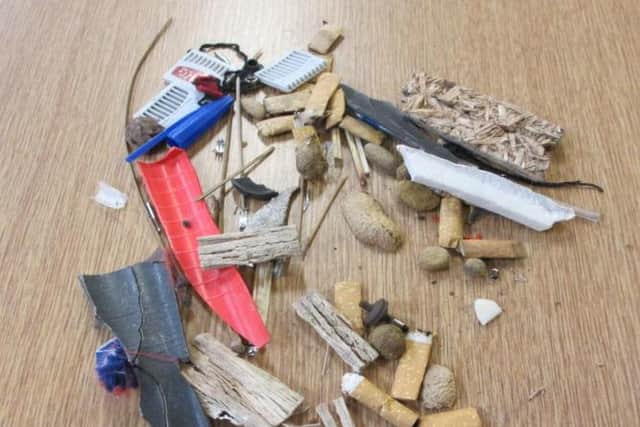 Floor sweepings, including cigarette ends, found in the punchbags