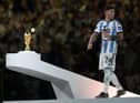 Enzo Fernandez of Argentina poses with the FIFA Young Player award trophy at the award ceremony following the FIFA World Cup Qatar 2022 Final match between Argentina and France at Lusail Stadium on December 18, 2022 in Lusail City, Qatar. (Photo by Lars Baron/Getty Images)