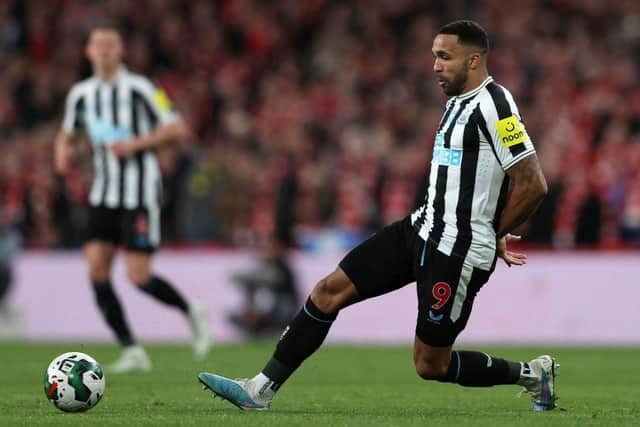 Newcastle United's English striker Callum Wilson passes the ball during the English League Cup final football match between Manchester United and Newcastle United at Wembley Stadium, north-west London on February 26, 2023. (Photo by ADRIAN DENNIS / AFP)