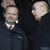 Manchester United's US co-chairman Avram Glazer (R) talks with Manchester United's executive vice-chairman Ed Woodward (L) before the English Premier League football match between Fulham and Manchester United at Craven Cottage in London on February 9, 2019.