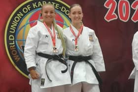 Ellie Smith and Eleisha Mitchinson with their medals.