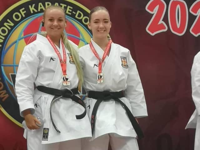 Ellie Smith and Eleisha Mitchinson with their medals.