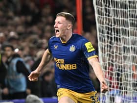 Newcastle United midfielder Elliot Anderson celebrates after scoring a goal at the City Ground which was later disallowed.