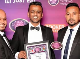 The Delhi 6 team celebrating the award