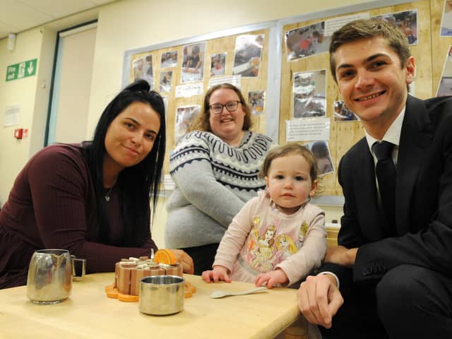 Parent Jess McLaughlin with daughter Hallie, alongside nursery manager Carole Greener and Cllr Adam Ellison.