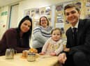 Parent Jess McLaughlin with daughter Hallie, alongside nursery manager Carole Greener and Cllr Adam Ellison.