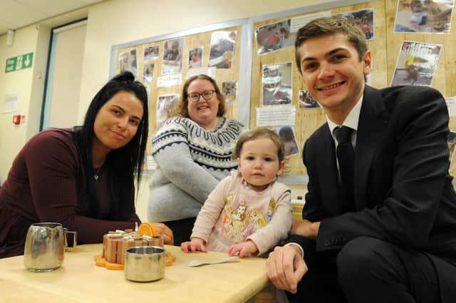 Parent Jess McLaughlin with daughter Hallie, alongside nursery manager Carole Greener and Cllr Adam Ellison.