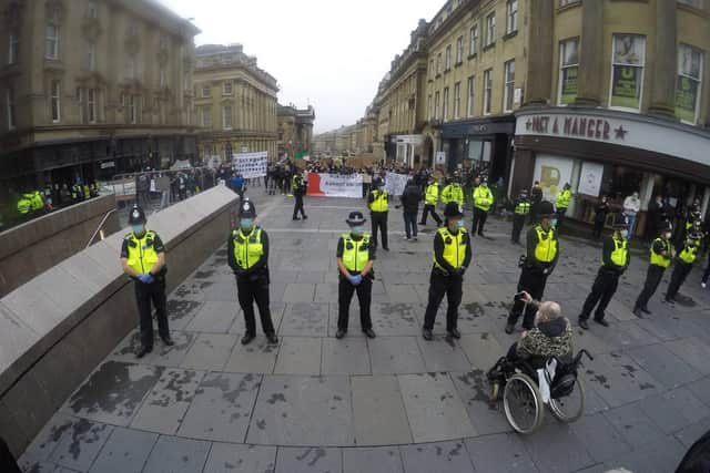 Police form a barrier between rival protesters in Newcastle city centre. Photo credit: North News and Pictures