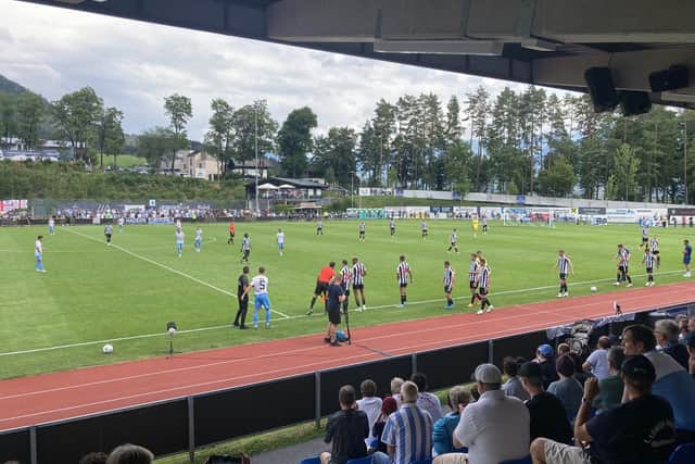 The Newcastle United substitutes take to the field against 1860 Munich.