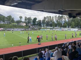 The Newcastle United substitutes take to the field against 1860 Munich.