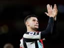Newcastle United midfielder Bruno Guimaraes applauds fans at the Emirates Stadium last week.