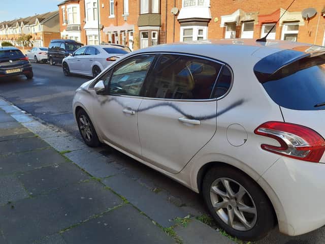 Some cars were spray painted.