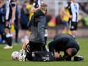 Ryan Fraser is treated after being caught with a high boot.