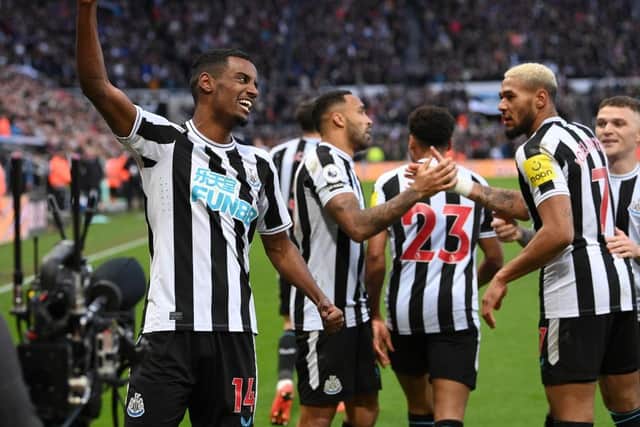 Newcastle United striker Alexander Isak celebrates with team mates after scoring the winning goal during the Premier League match between Newcastle United and Fulham FC at St. James Park on January 15, 2023 in Newcastle upon Tyne, England. (Photo by Stu Forster/Getty Images)