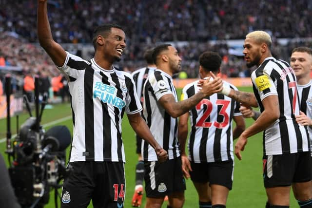 Newcastle United striker Alexander Isak celebrates with team mates after scoring the winning goal during the Premier League match between Newcastle United and Fulham FC at St. James Park on January 15, 2023 in Newcastle upon Tyne, England. (Photo by Stu Forster/Getty Images)