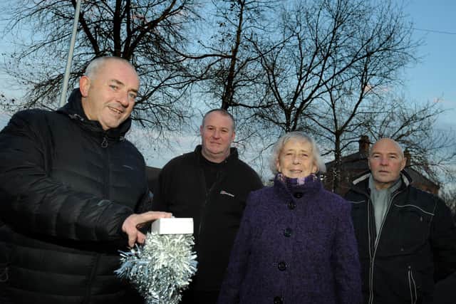 South Tyneside Council Cllr Ernest Gibson switches on Christmas Lights at the former St Clare's Hospice, Primrose, Jarrow, with ward Councillors Moira Smith, David Kennedy and Paul Milburn.